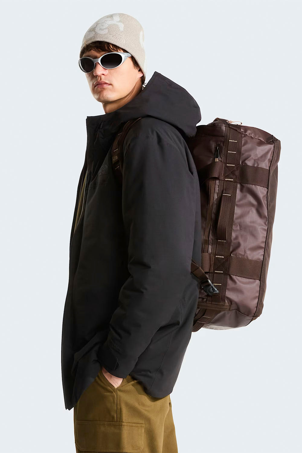 brown north face backpack wearing Borealis Sling Bag it has since become a classic on campus and on the job The North Face Recon Review