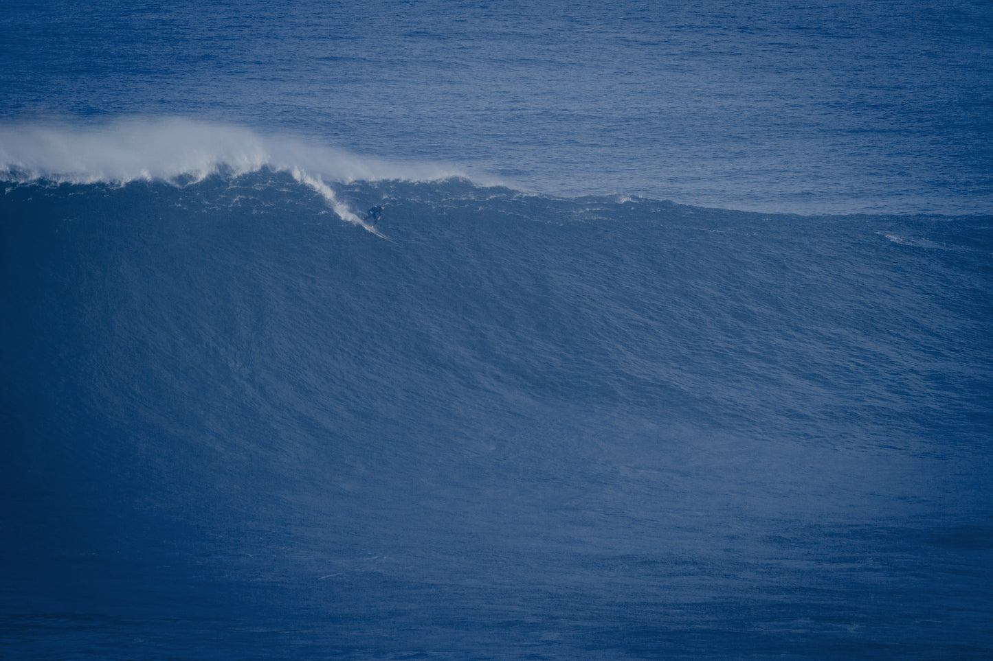 Tom Lowe [GR] with a Chris Christenson Gun at Nazaré a few years back