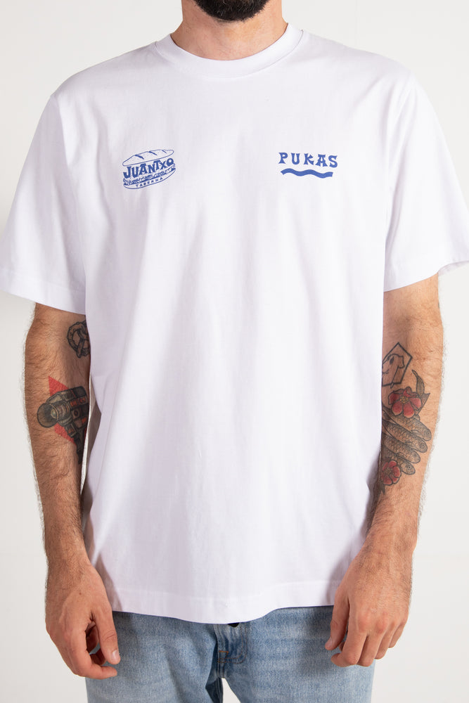 PUKAS-SURF-SHOP-TEE-MAN-SURFING-THE-BASQUE-COUNTRY-JUANTXO-OVERSIZED-WHITE