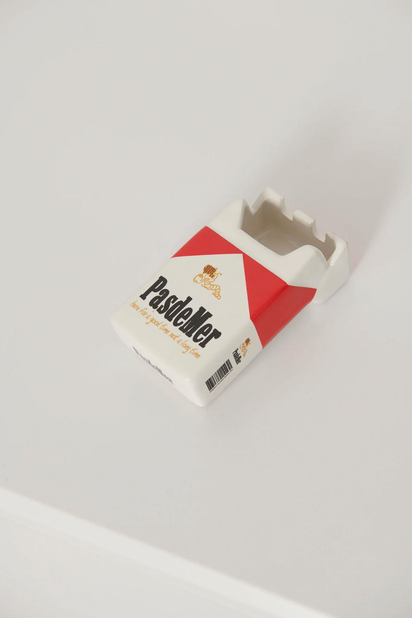 Pukas Surf Shop Pas de Mer ceramic ashtray in red and white silhouette
