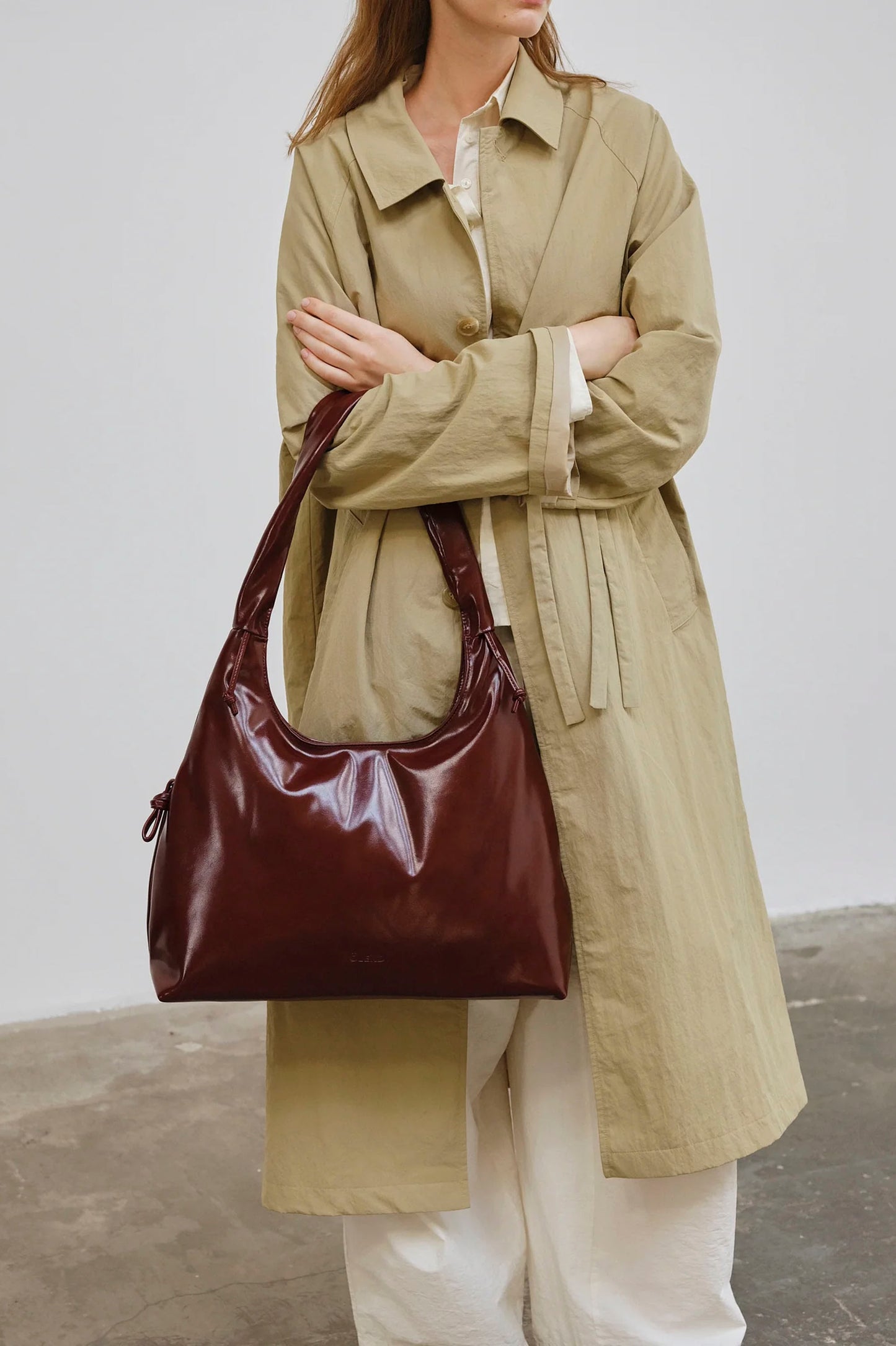 Cherry red Nicole bag by ÖLEND - front view showing compact design