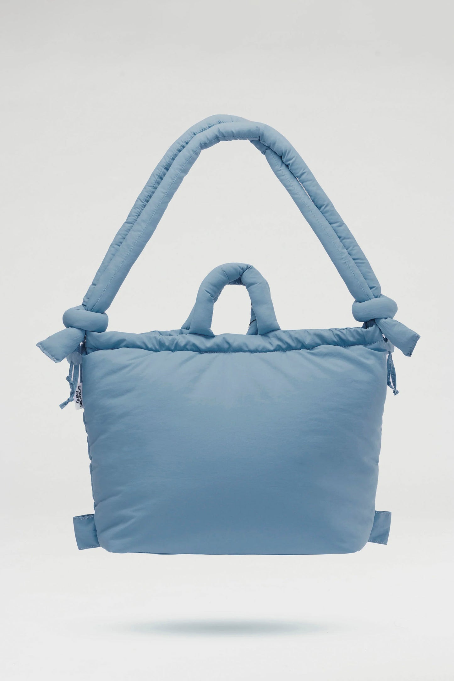 Ölend Ona Soft in Light blue bag with braided handle on a white background