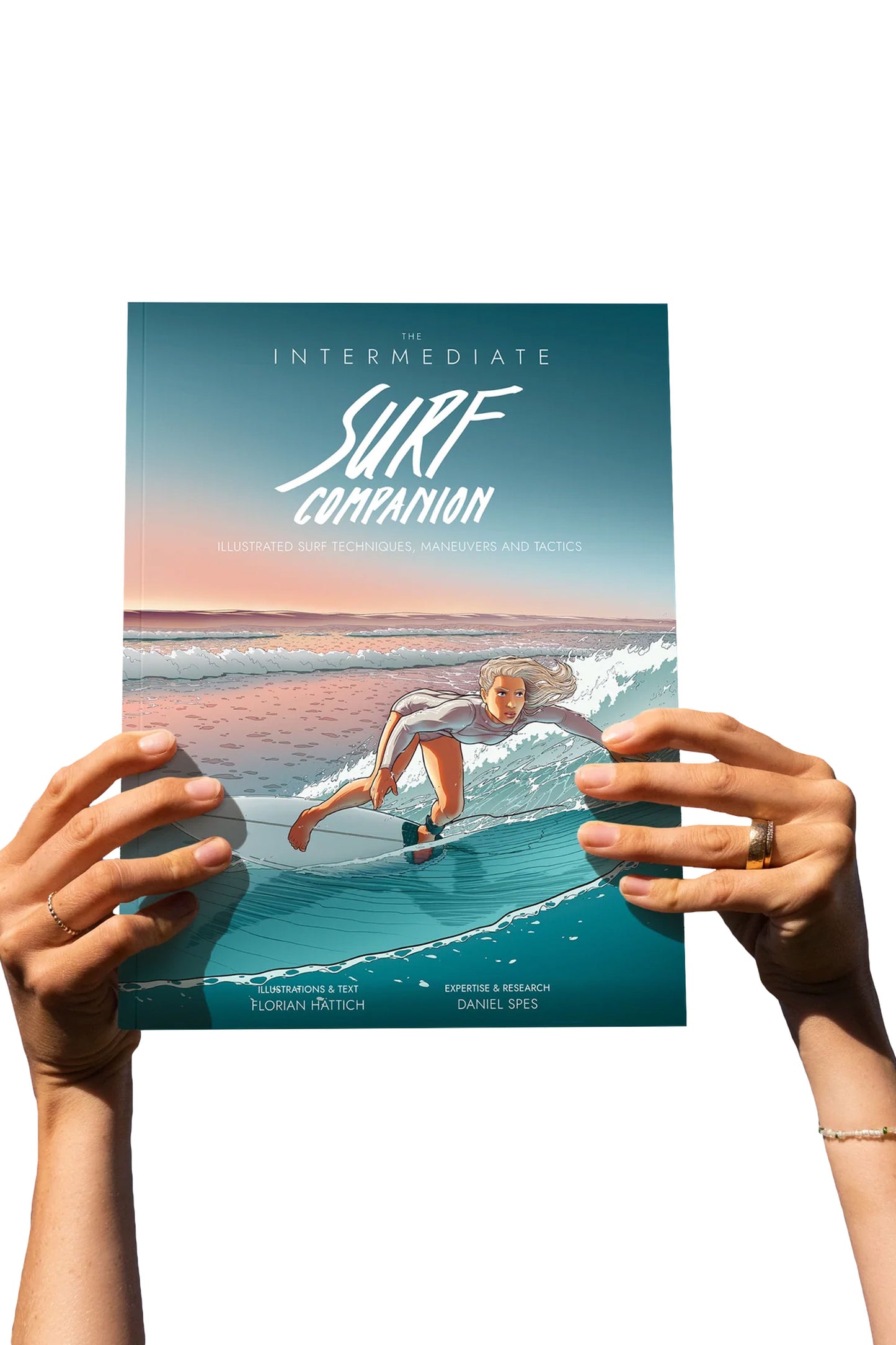 Hands holding The Intermediate Surf Companion book upright
