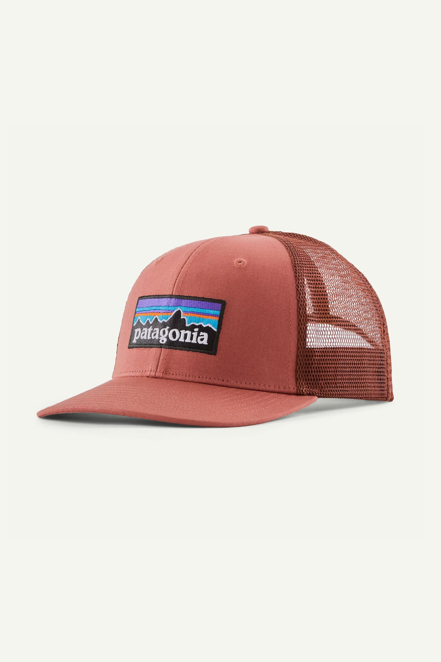 Pink and brown cap with Patagonia logo on a white background