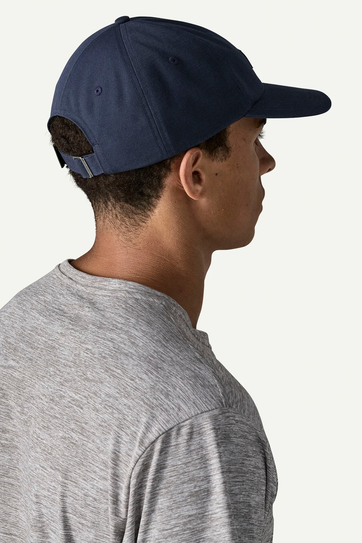 Man wearing a p-6 label trad cap in new navy colour - back view