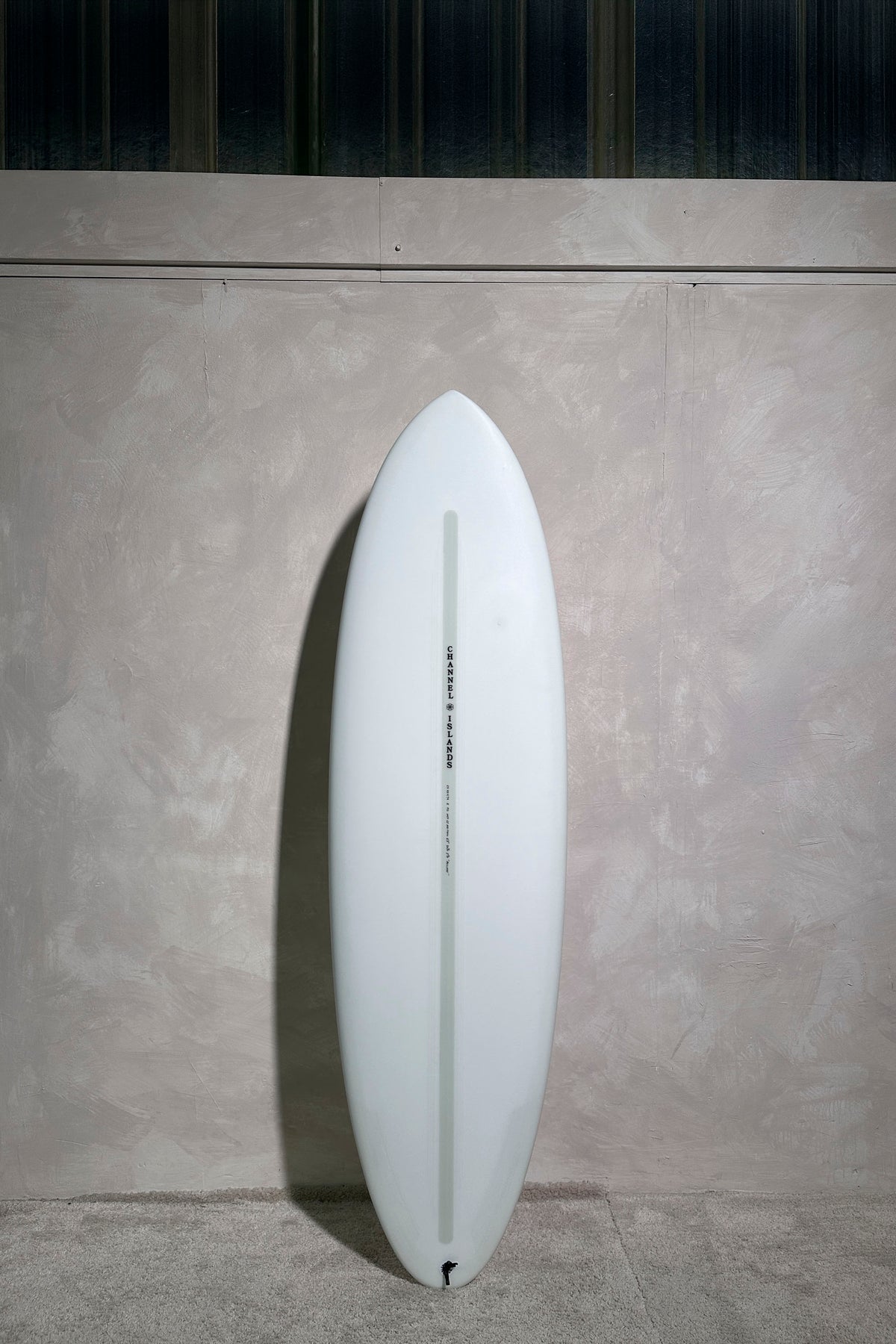 White Channel Islands Surfboard Ci mid twin size 6'3" on a white background by Pukas Surf Shop