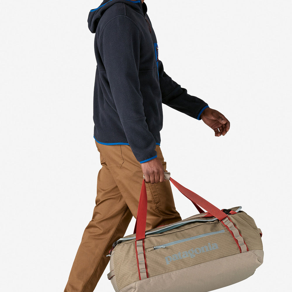 
                      
                        Pukas-Surf-Shop-Duffel-Pataagonia-Black-Hole-55L-Beige
                      
                    