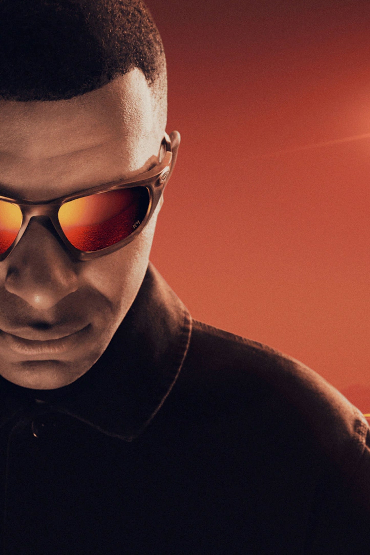 Oakley Lateralis KM Signature sunglasses with warm tones and polished brass finish - Kylian Mbappé collaboration branding