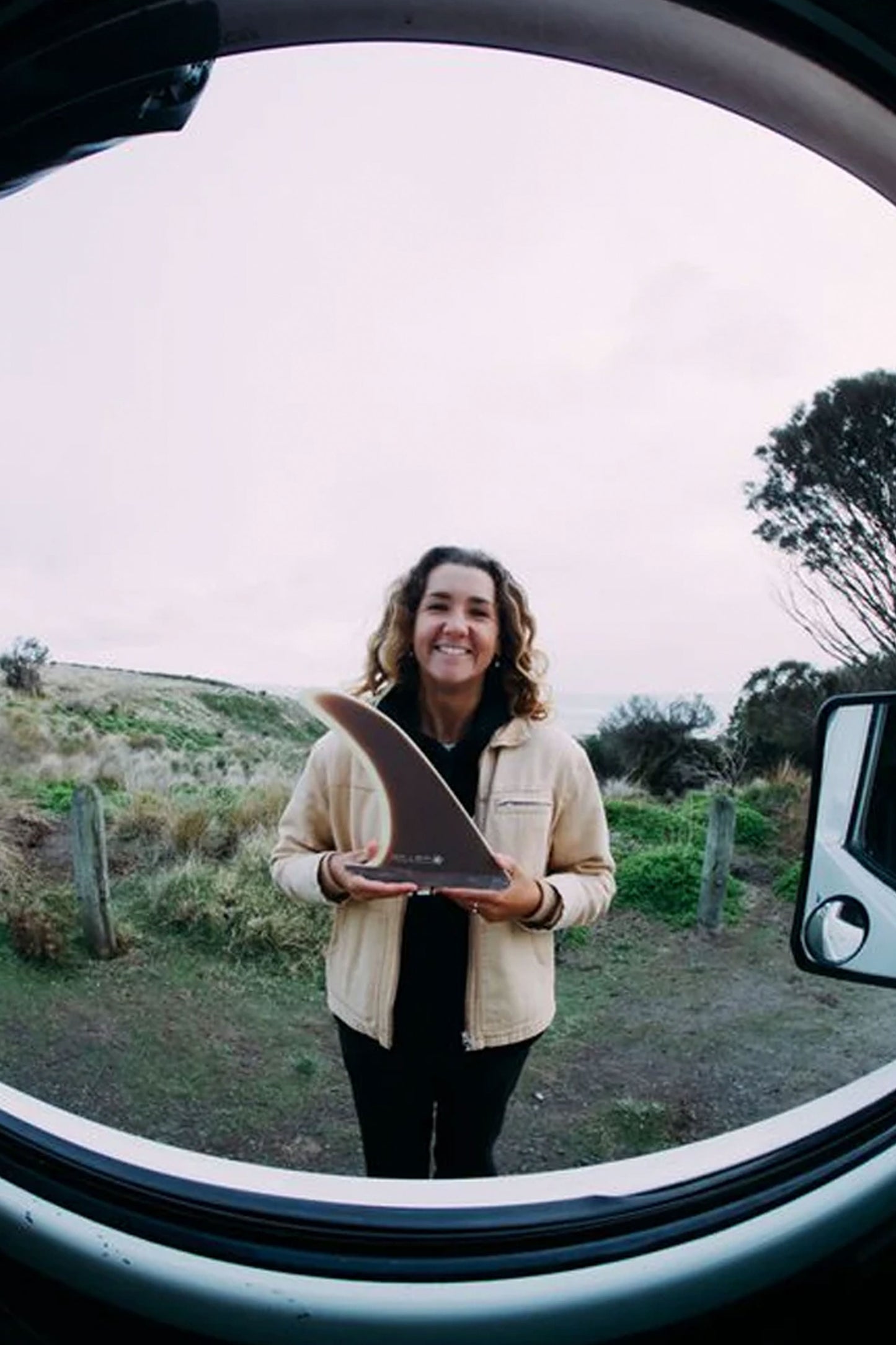 IZZY HENSHAL X DEFLOW single fin in 9.75 - Izzy holding the fin