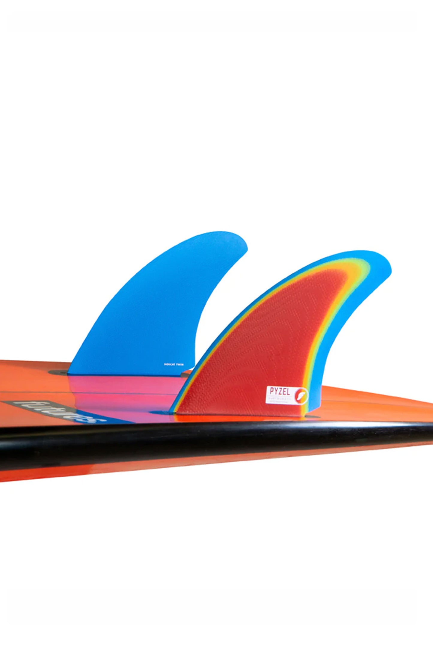 Twin fins in multicolor fiberglass showing side profile