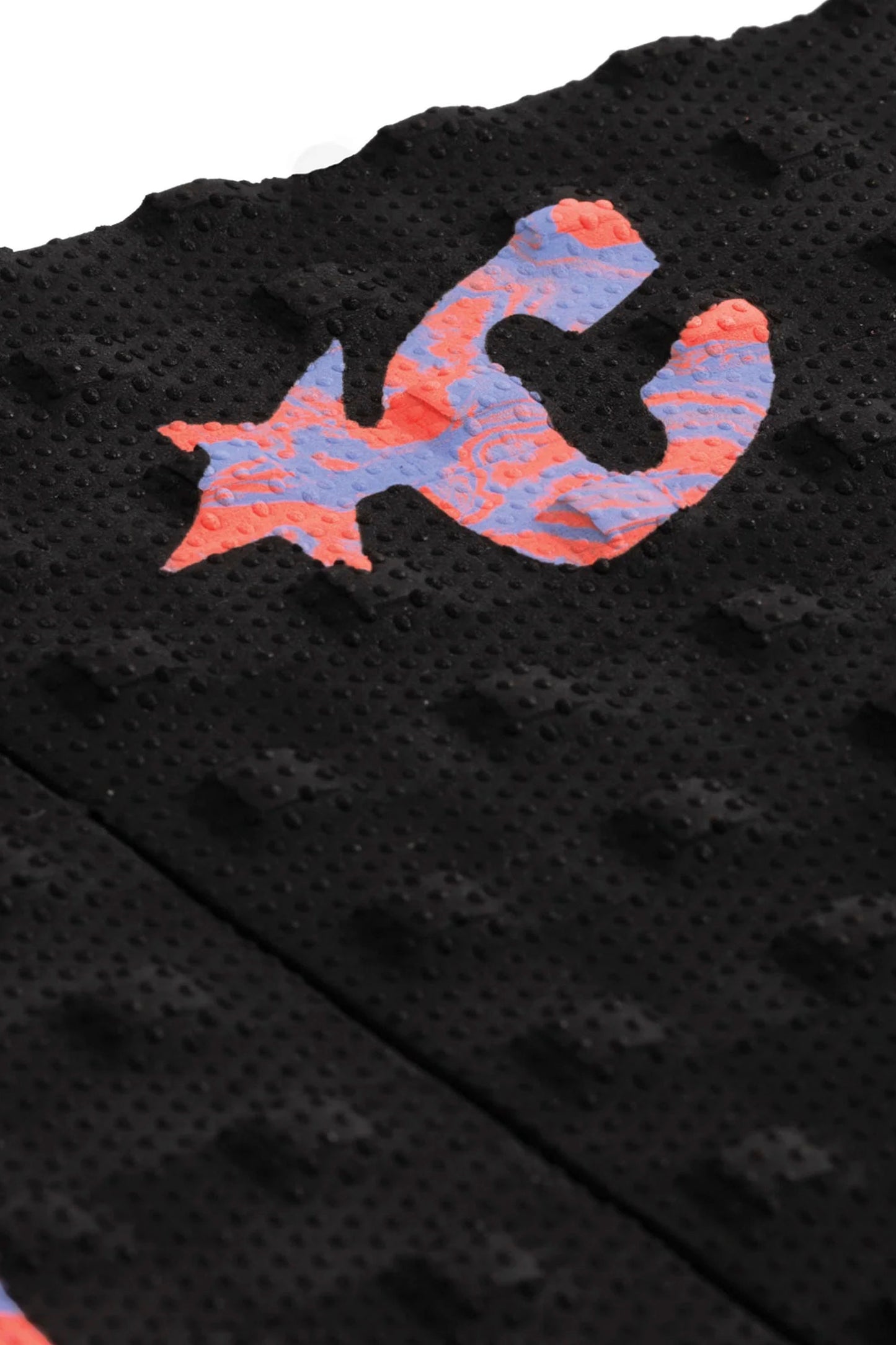 Creatures Grom Mick Fanning grip pad with THERMO-LITE square loc traction pattern