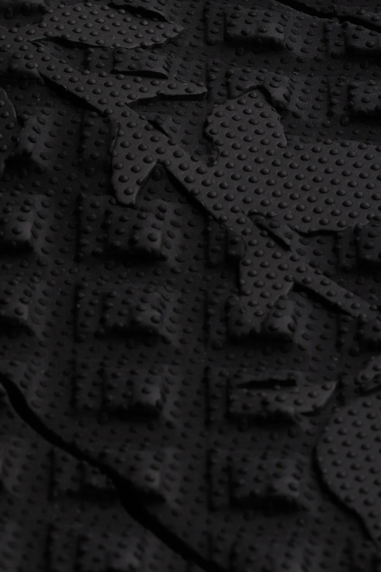 Close-up of Creatures Pin Tail Pro pad THERMO-LITE Diamond Loc II traction pattern
