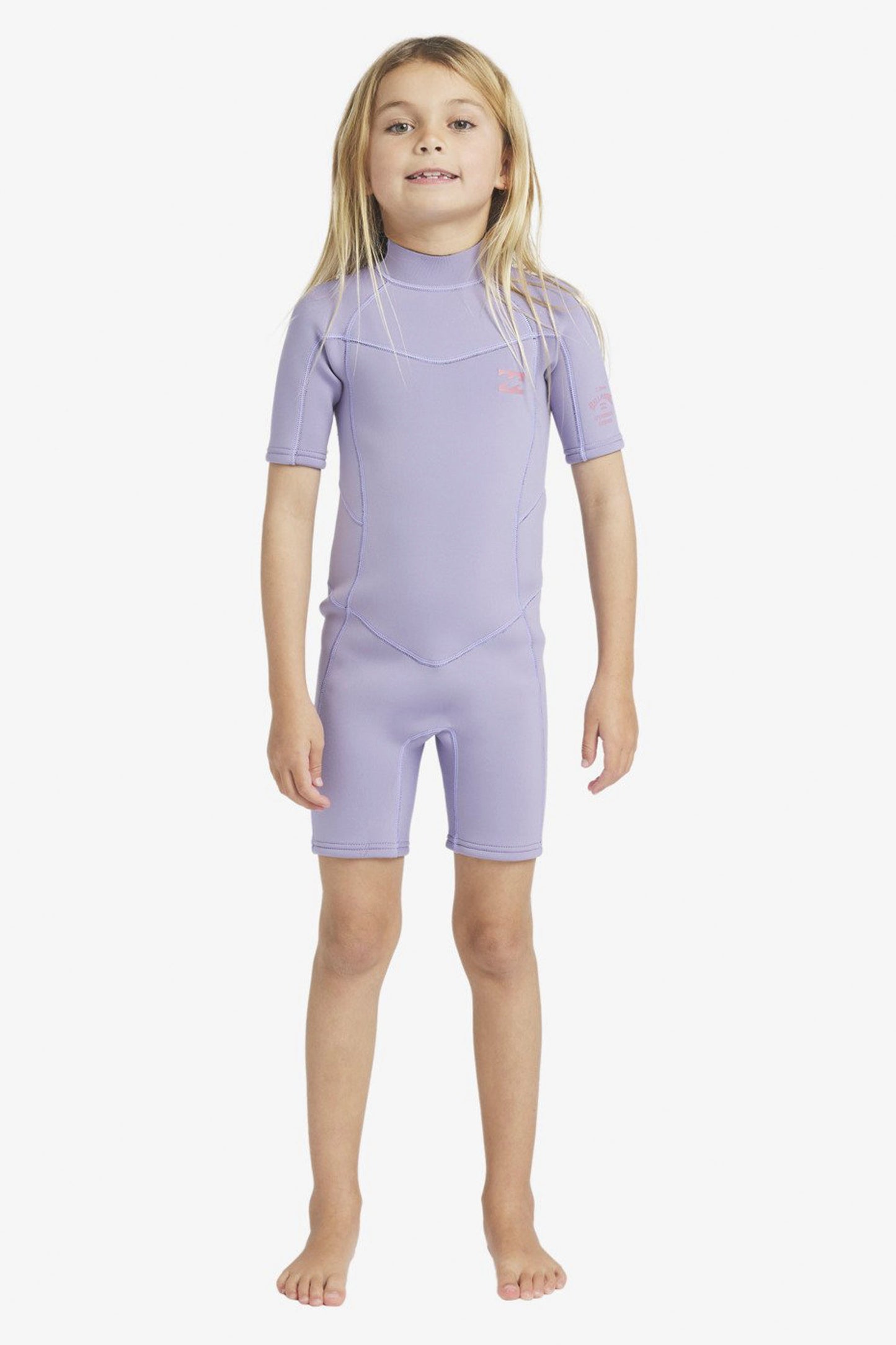 Child wearing a purple Billabong Absolute 2/2mm wetsuit on a white background