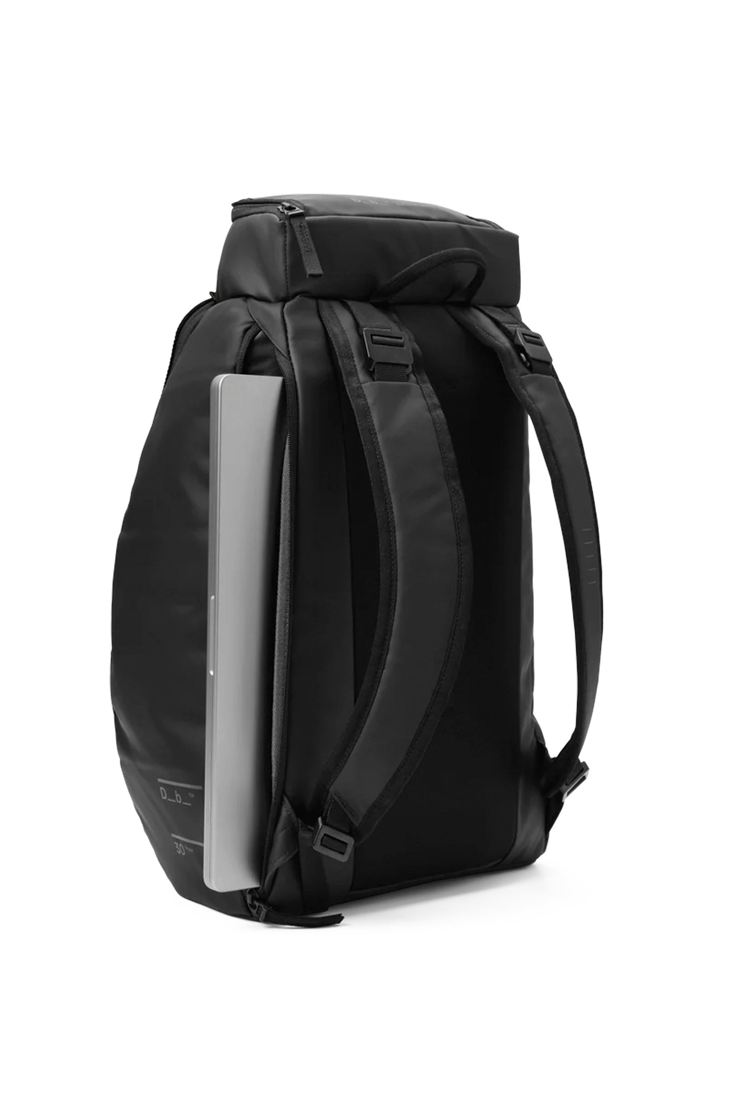 Db Hugger Backpack 30L in Black Out – structured 30L daypack with Rib Cage Technology, padded 16″ laptop compartment and weather-resistant exterior, available at Pukas Surf Shop