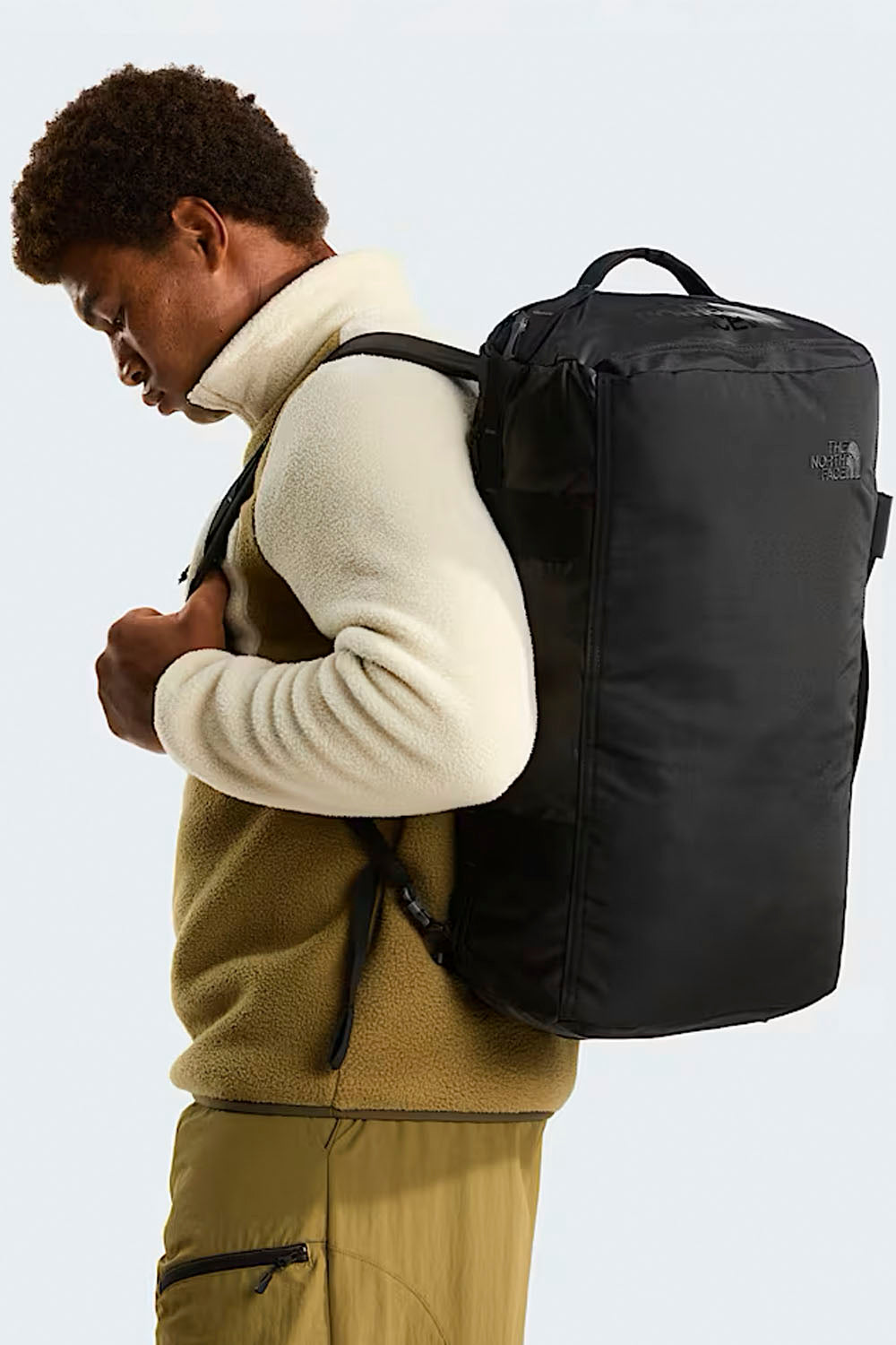 The North Face Base Camp Voyager Duffel 32L in Black – rugged travel duffel with laptop pocket, available at Pukas Surf Shop