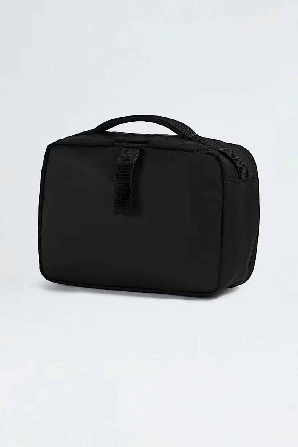 Black toiletry bag on a light gray background