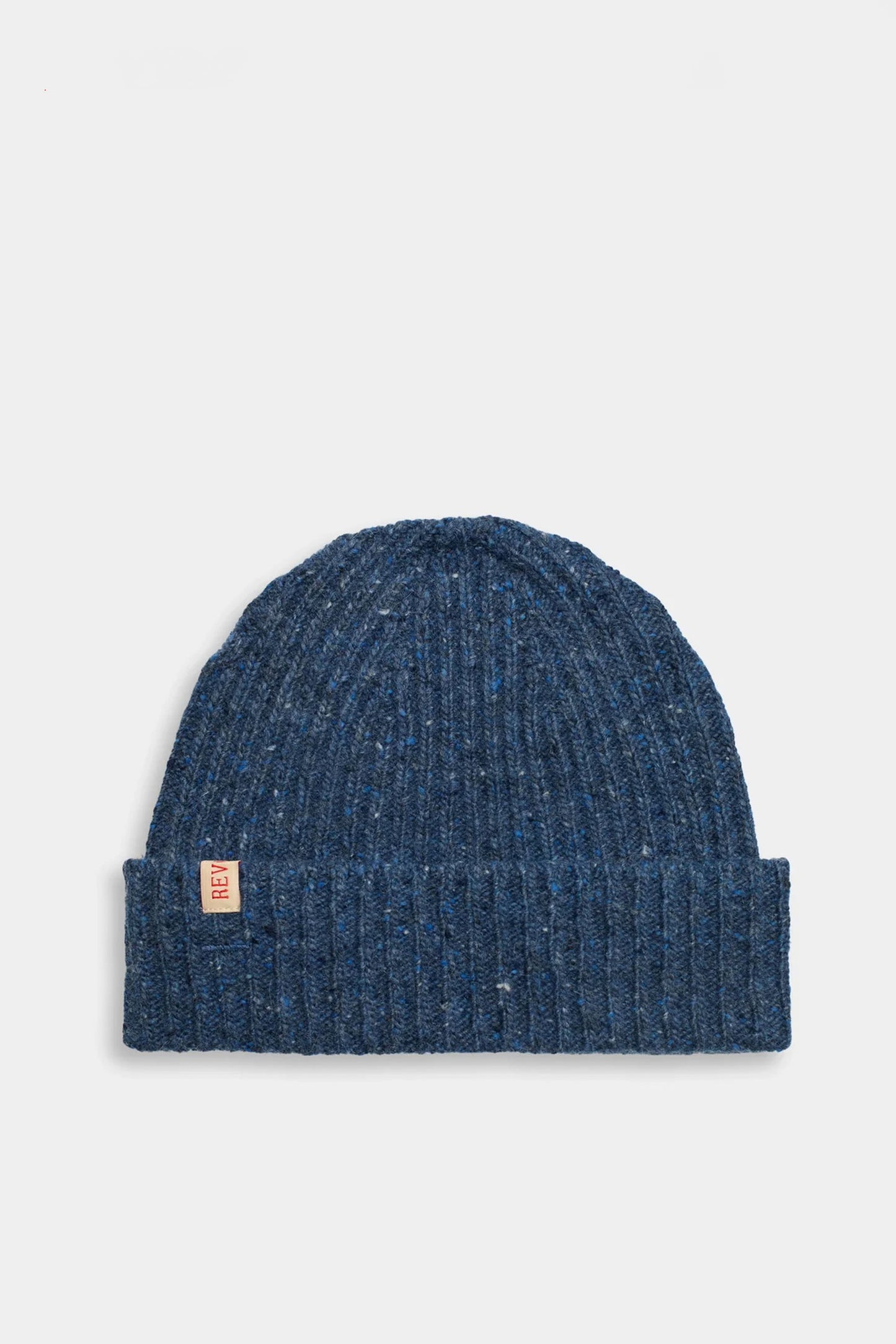 Blue knit Revolution beanie with a brand tag Pukas Surf Shop
