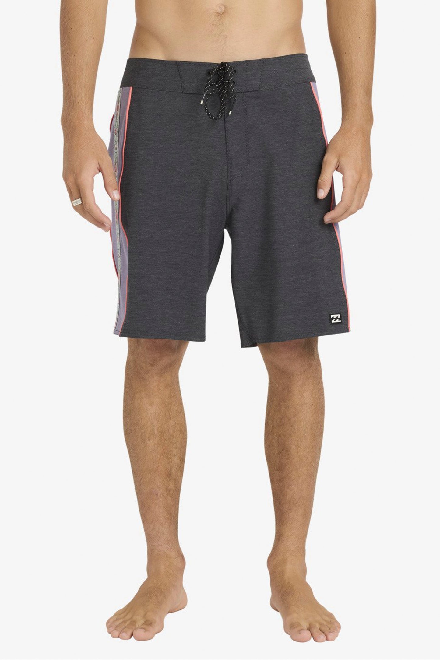 Man wearing BILLABONG DBAH Pro boardshort on a white background