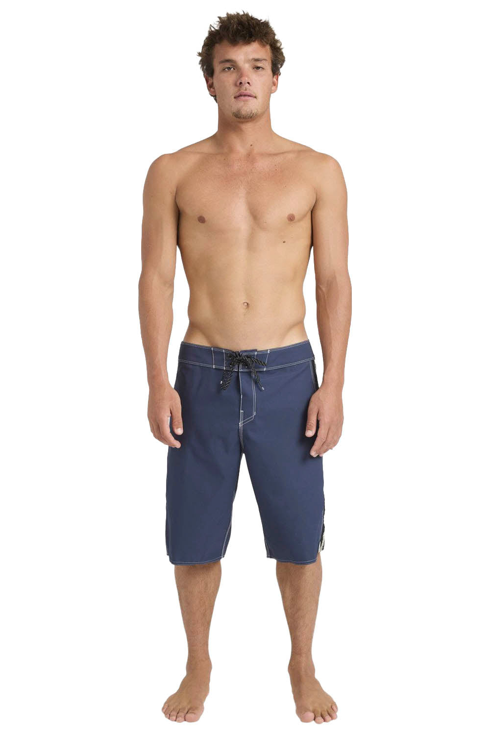 Man wearing blue swim shorts on a white background