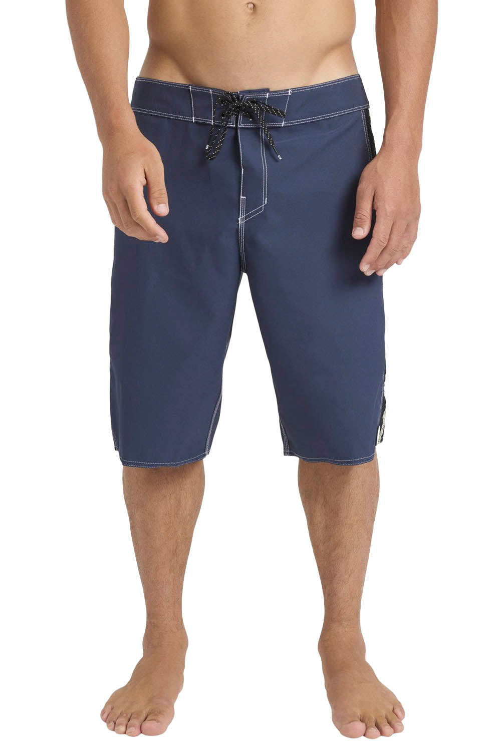 Navy blue board shorts worn by a person on a white background