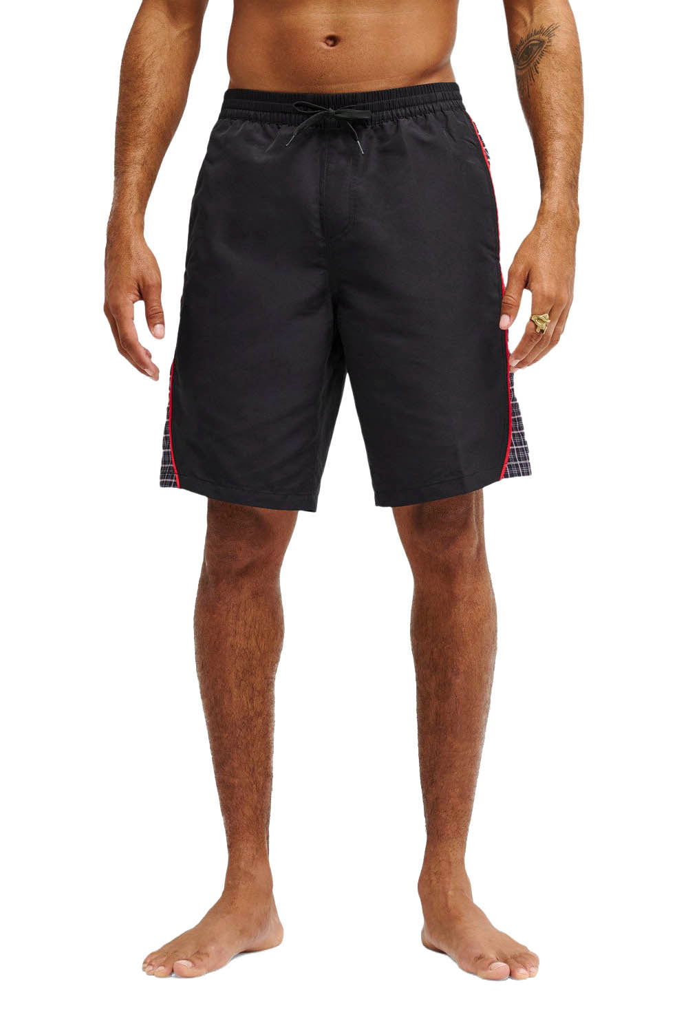 Black swim shorts with red and blue trim on a white background