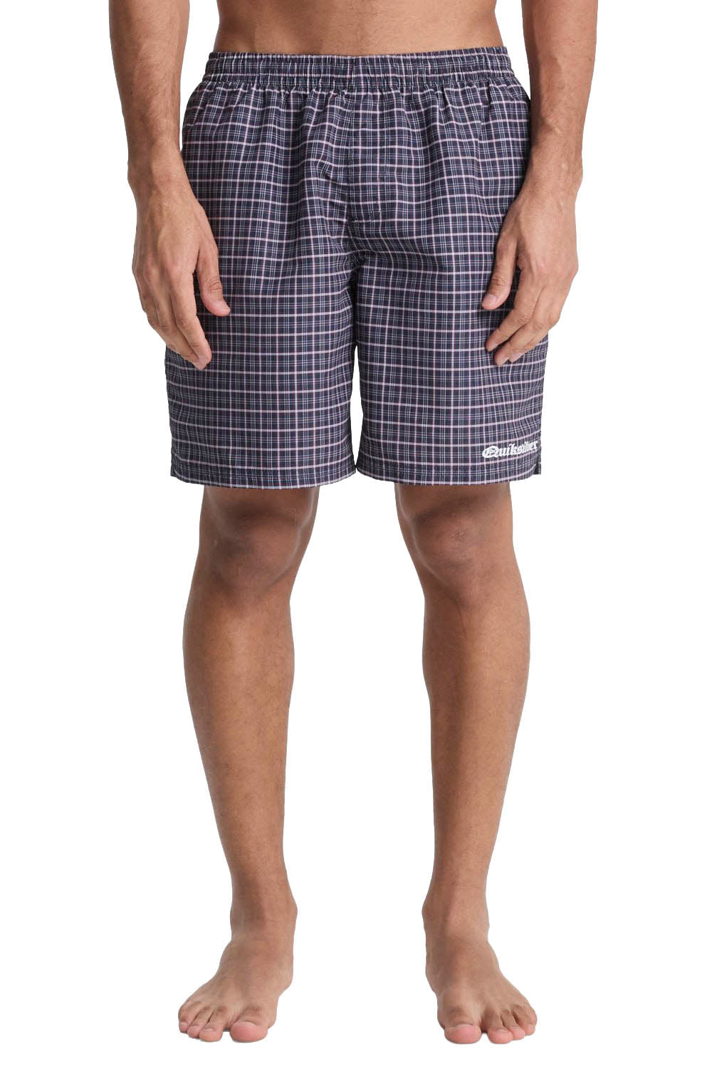 Person wearing blue plaid boxer shorts on a white background