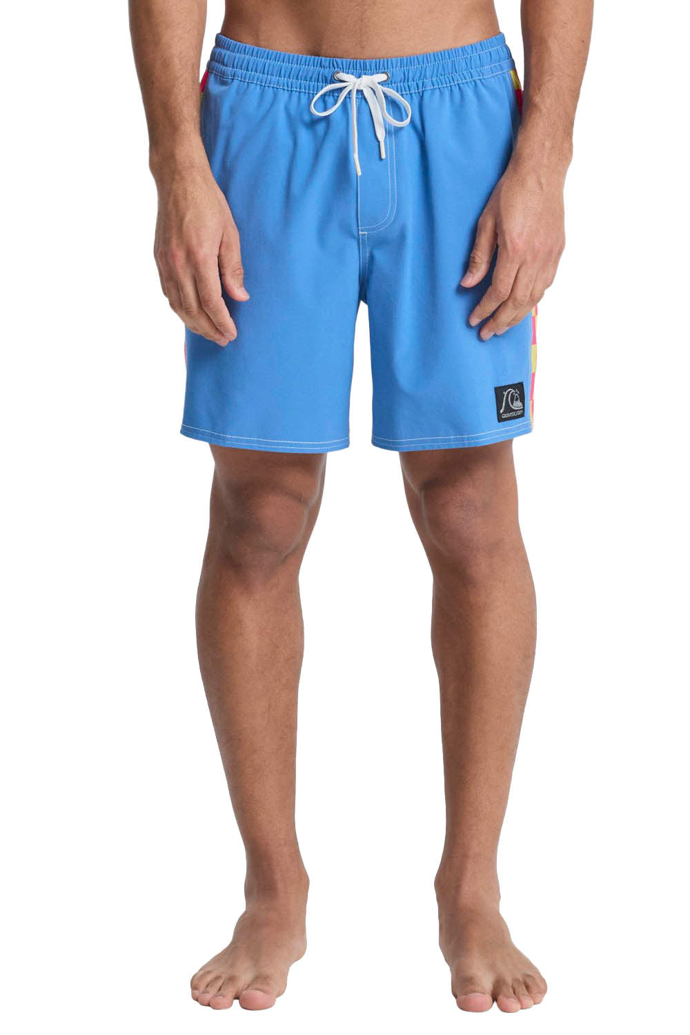 Person wearing blue swim shorts on a white background