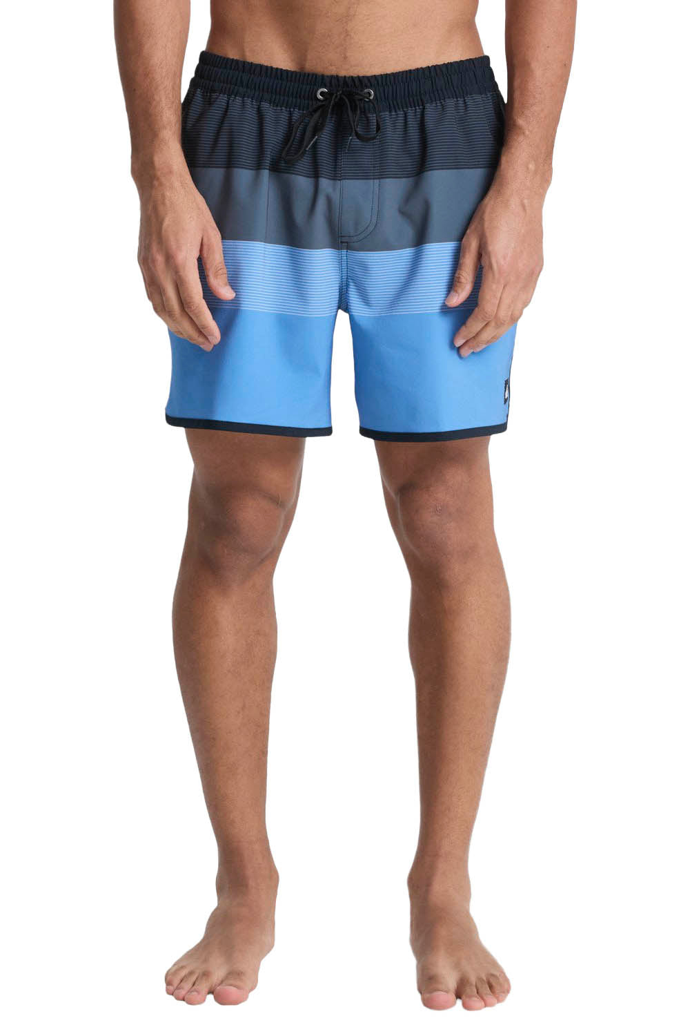 Blue and black striped swim shorts worn by a person on a white background