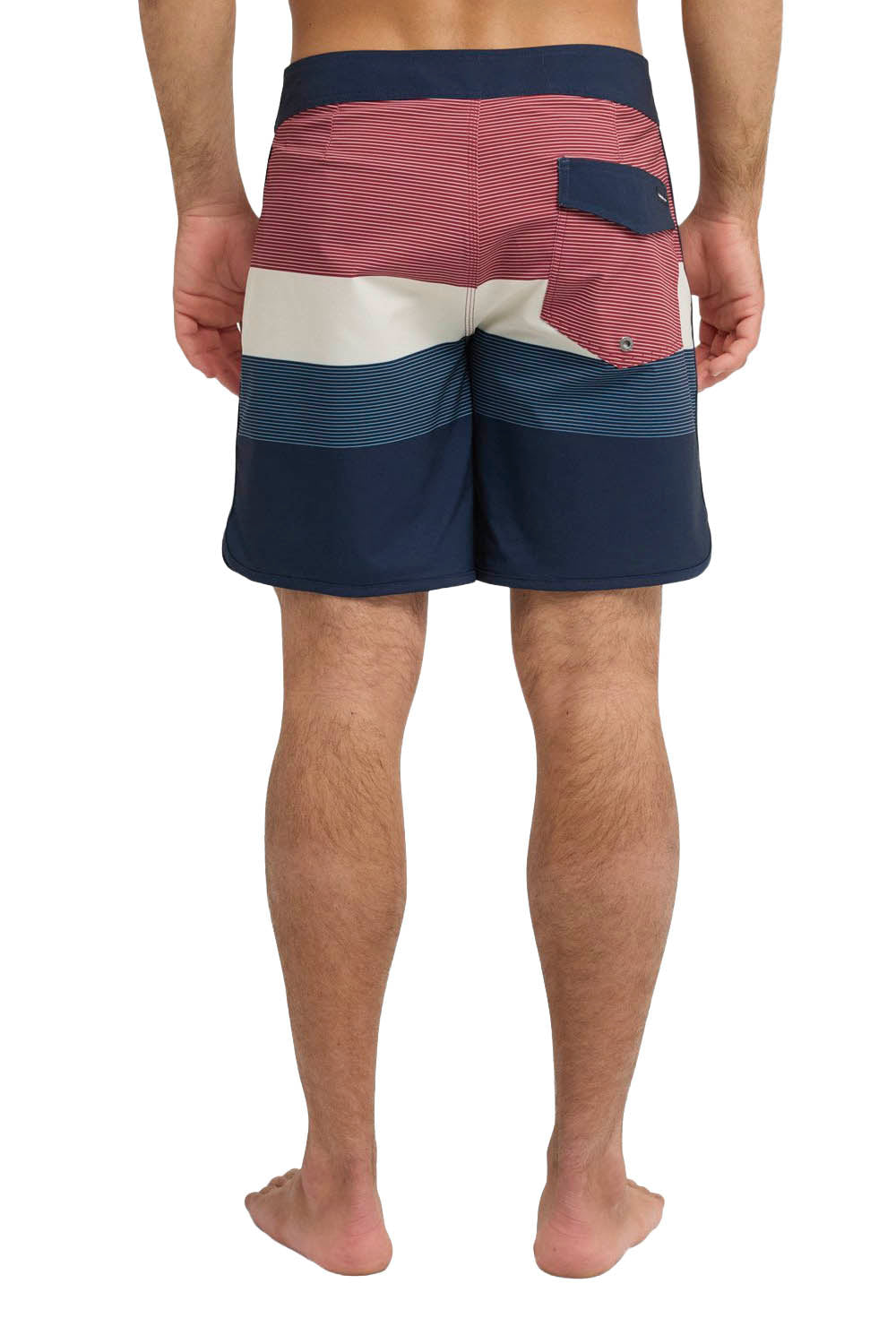 Colorful striped swim shorts worn by a person on a white background