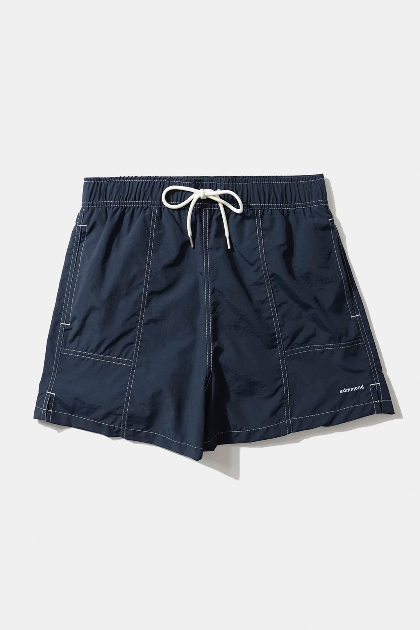 Edmmond Mini Logo Boardshort in plain navy — men's minimal surf boardshort at Pukas Surf Shop