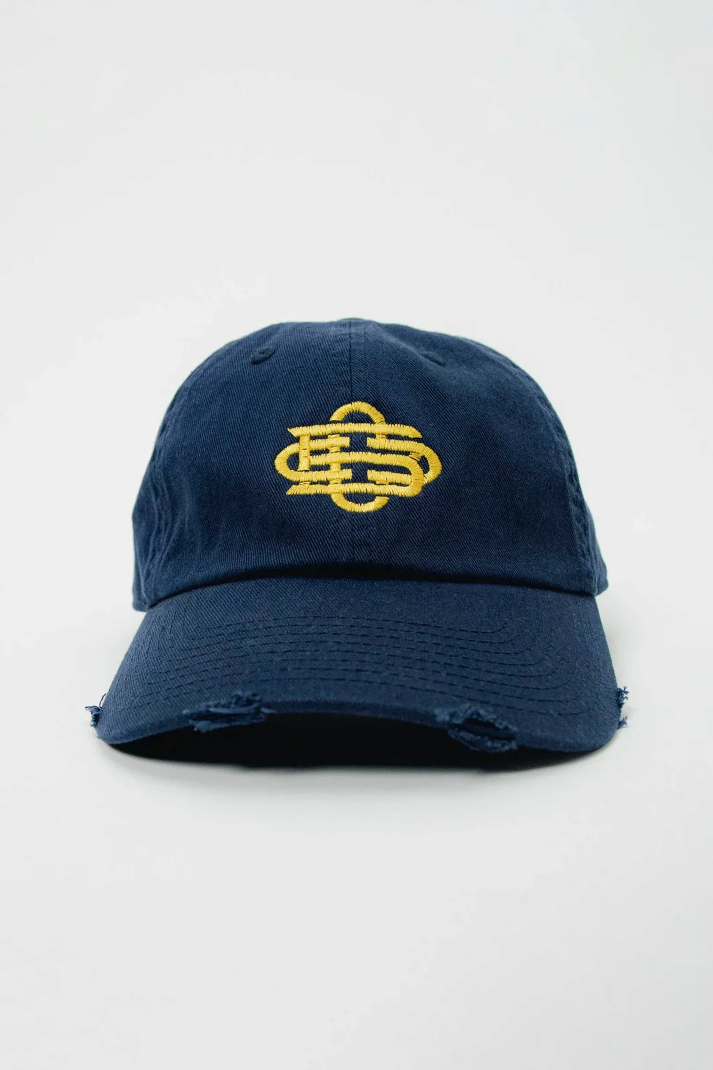 CUCO BOARD CLUB Monogram Low Profile Cap in Dark Ocean Navy - Gold embroidered logo detail on heavyweight cotton twill dad hat