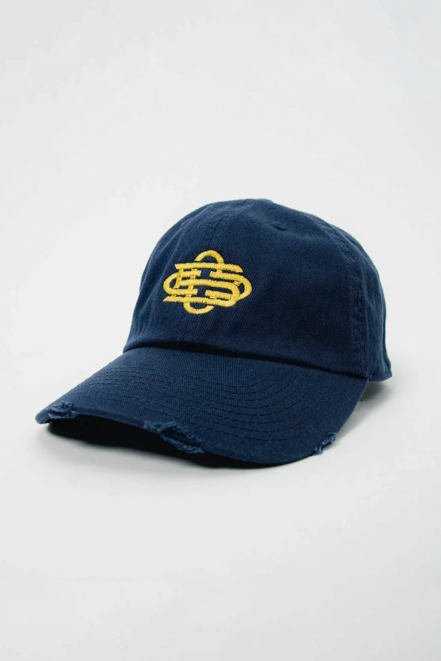 CUCO BOARD CLUB Monogram Low Profile Cap in Dark Ocean Navy - Gold embroidered logo detail on heavyweight cotton twill dad hat