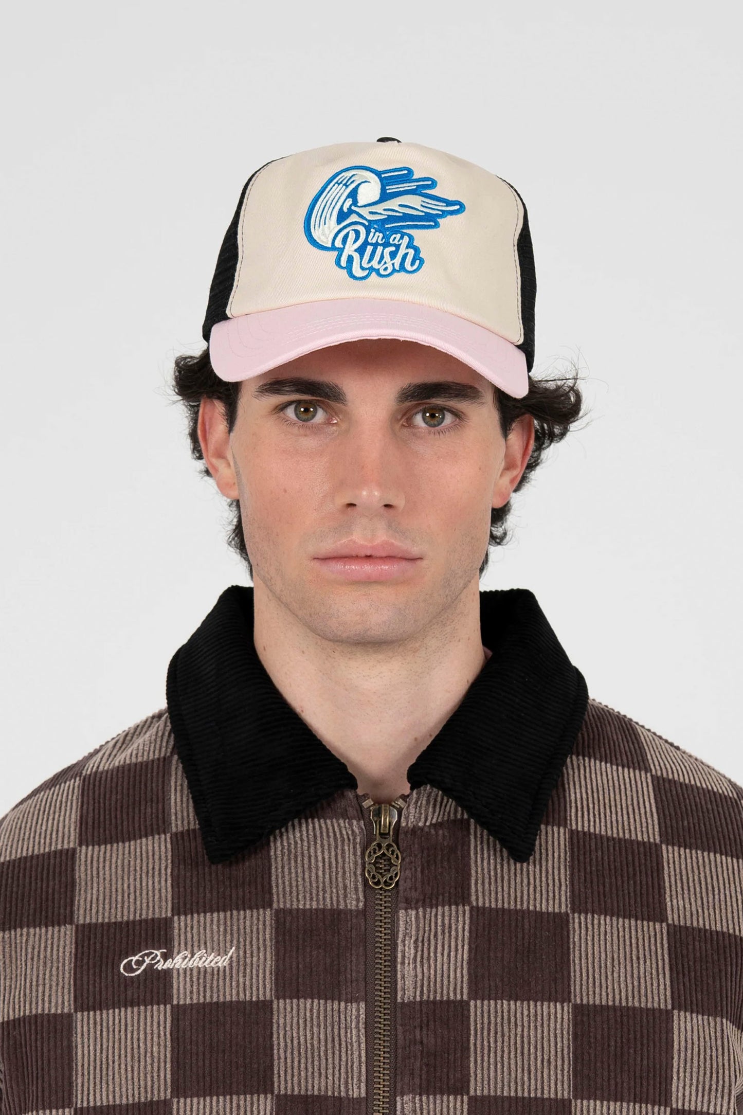 PROHIBITED Tire 5-panel trucker cap in cream - front view with racing embroidery