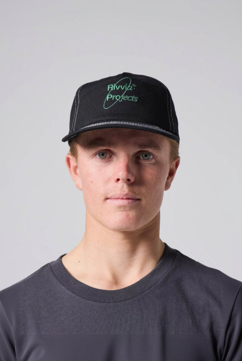 Rivvia Projects Sci-Fi Cap Pigment Black – front view, contrast stitch detail