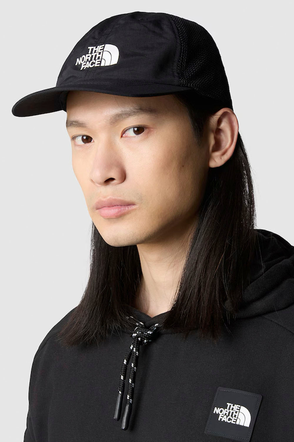 The North Face Horizon Trucker cap in TNF Black – structured mesh-back hat for men at Pukas Surf Shop
