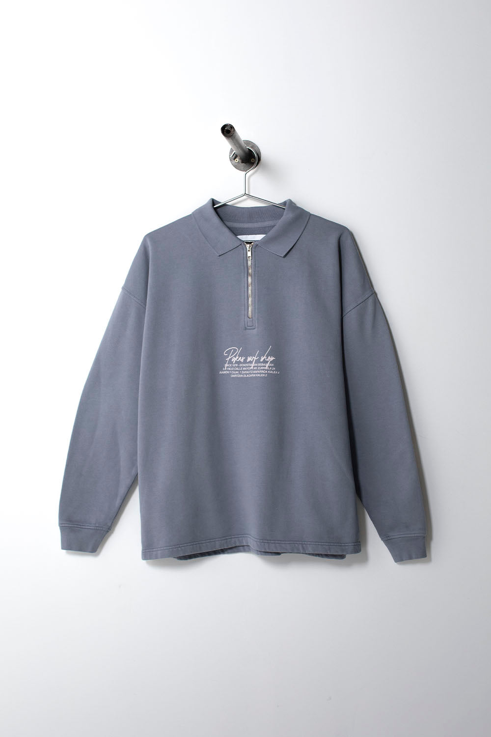 Gray long-sleeve polo shirt with text on a white background