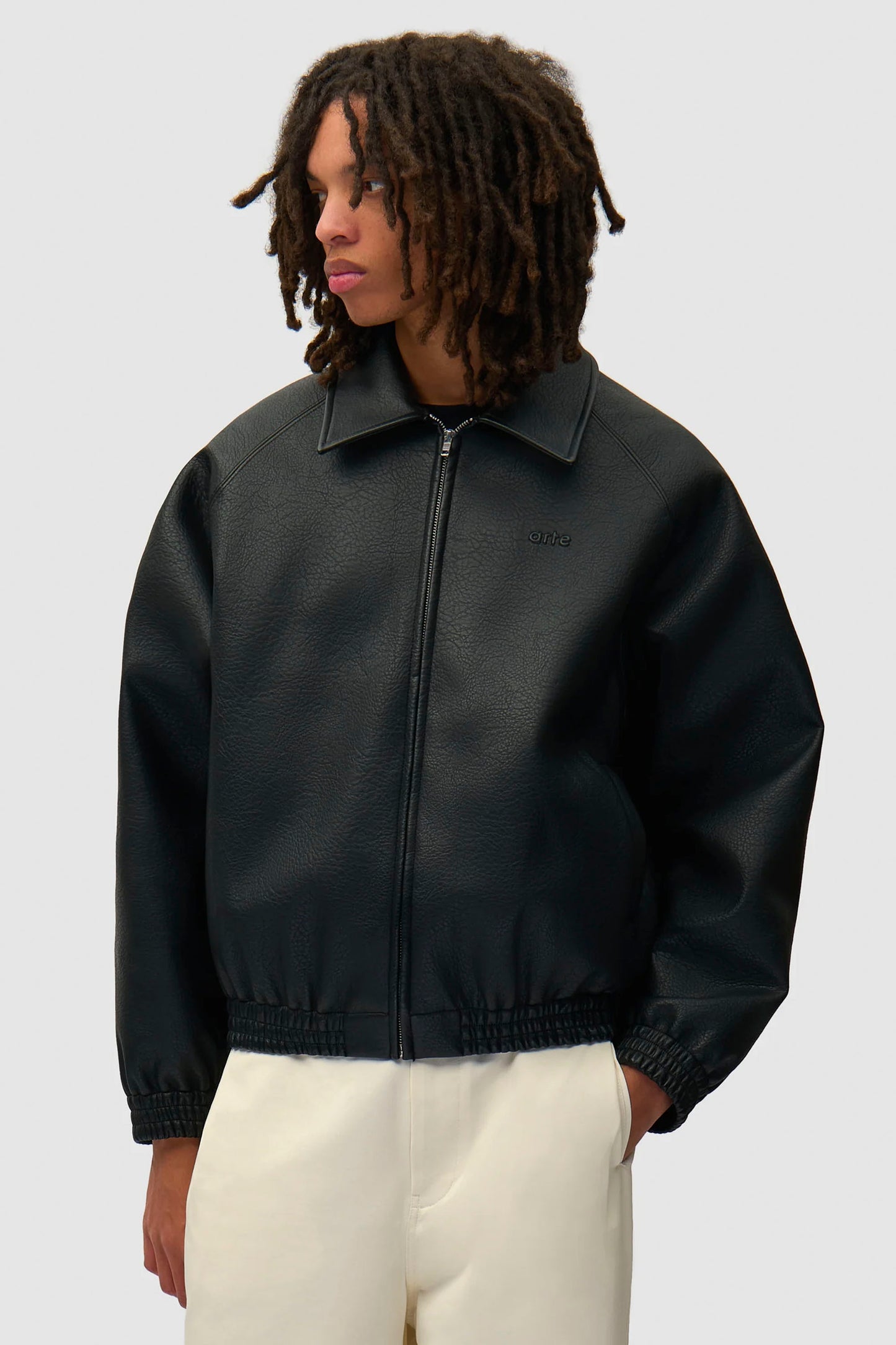 Pukas Surf Shop Arte Antwerp black leather jacket clean silhouette relaxed style