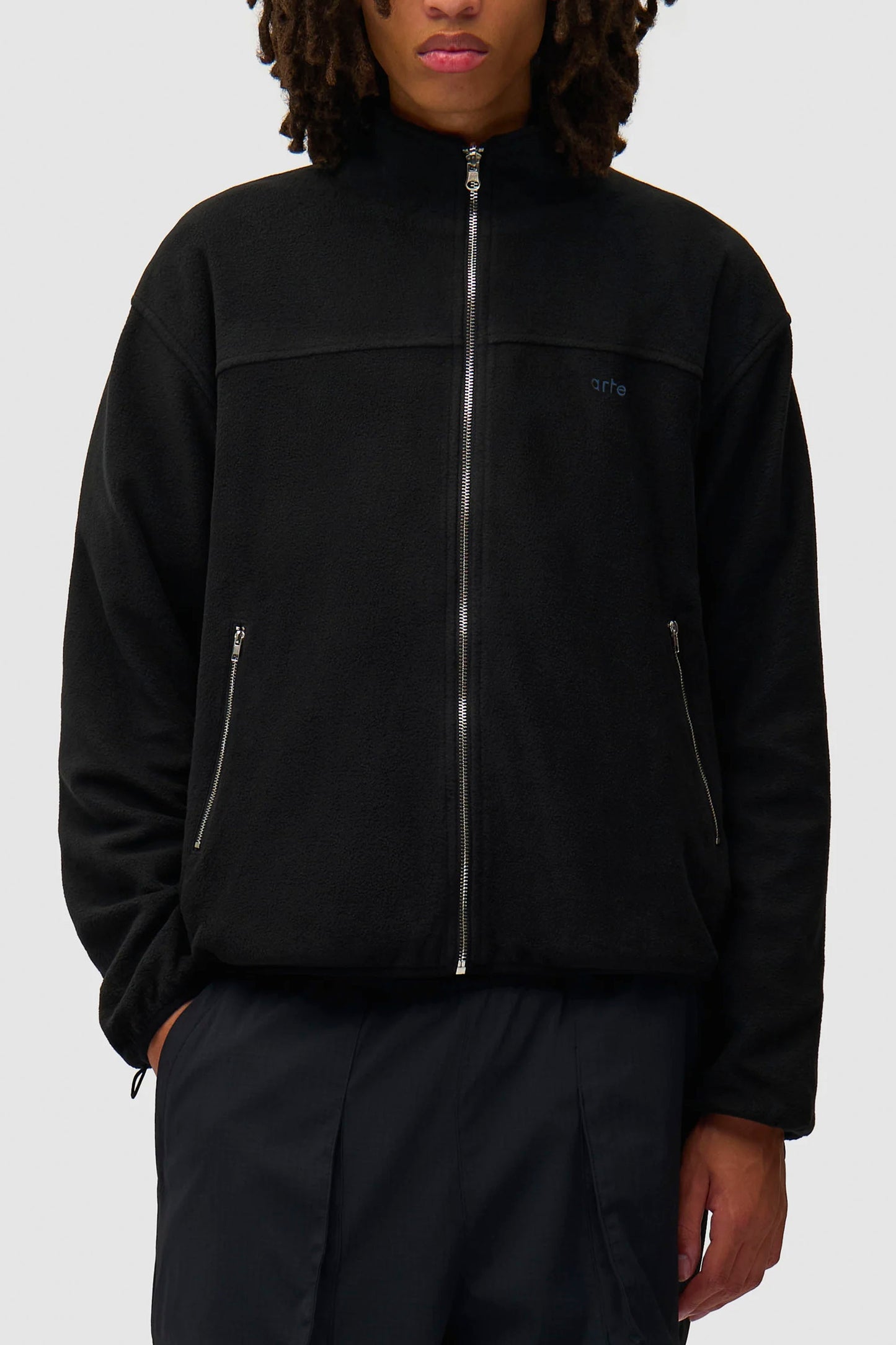 Pukas Surf Shop Arte Antwerp reversible technical polar jacket black water-repellent inner fleece drawcord hem