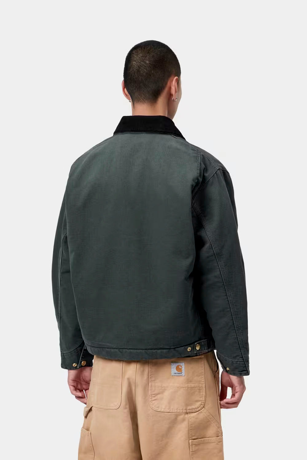 CARHARTT WIP OG Detroit Jacket in Raven Black Stone Canvas — front outfit view showing black stone canvas Detroit jacket styled with casual streetwear
