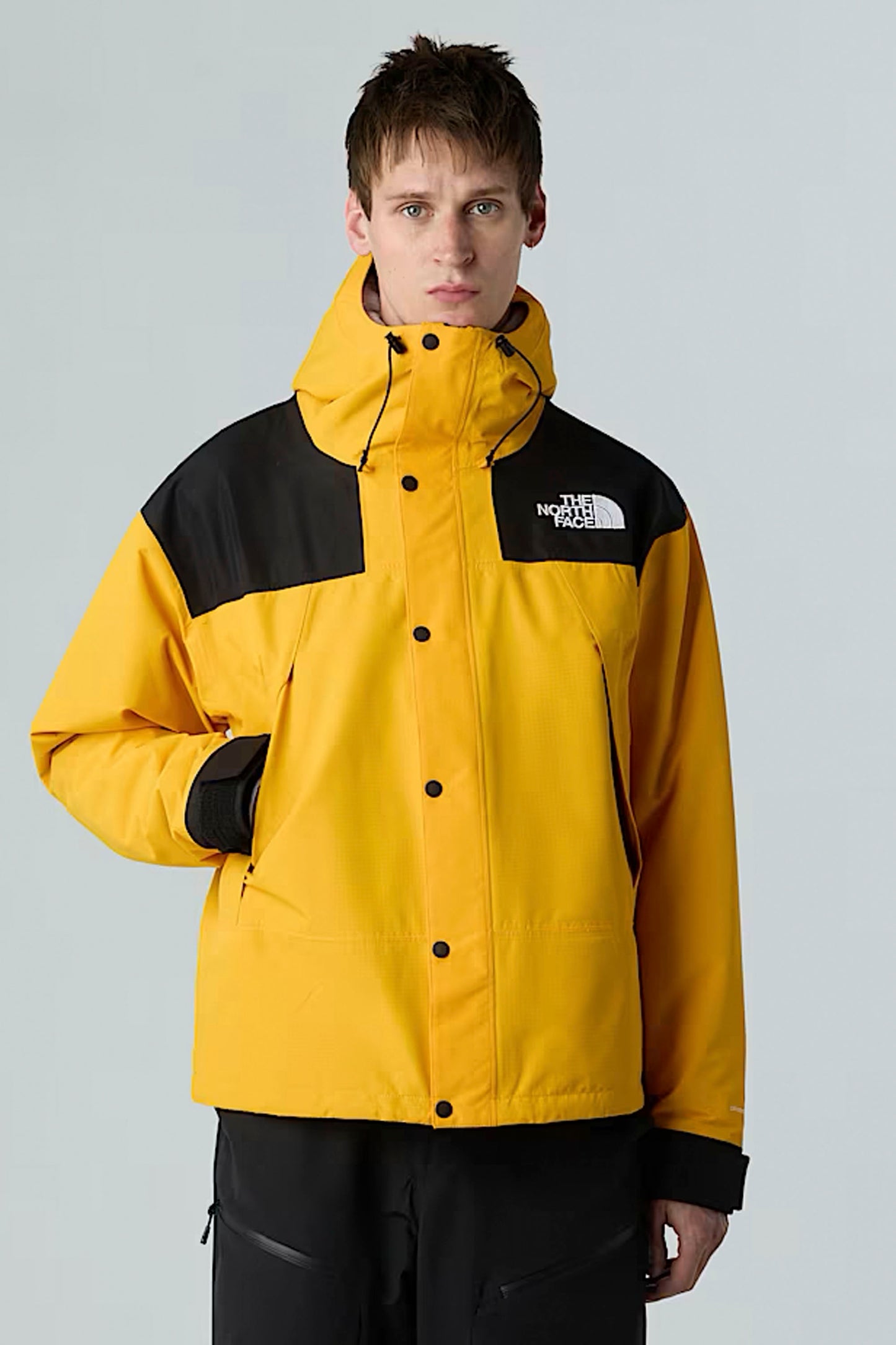 Pukas Surf Shop The North Face DryVent Mono Mountain Jacket in Summit Gold / TNF Black