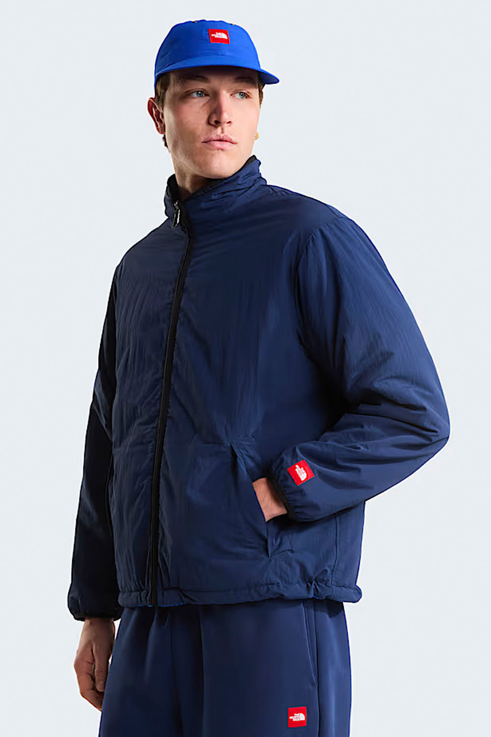 The North Face TNF Red Box Reversible Fleece Jacket in Summit Navy – unisex reversible fleece, available at Pukas Surf Shop