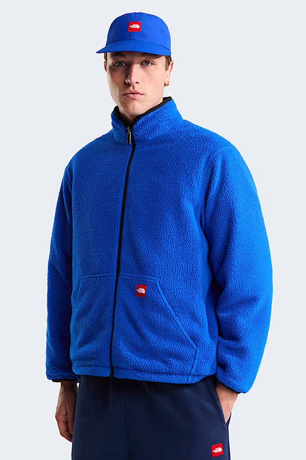 The North Face TNF Red Box Reversible Fleece Jacket in Summit Navy – unisex reversible fleece, available at Pukas Surf Shop