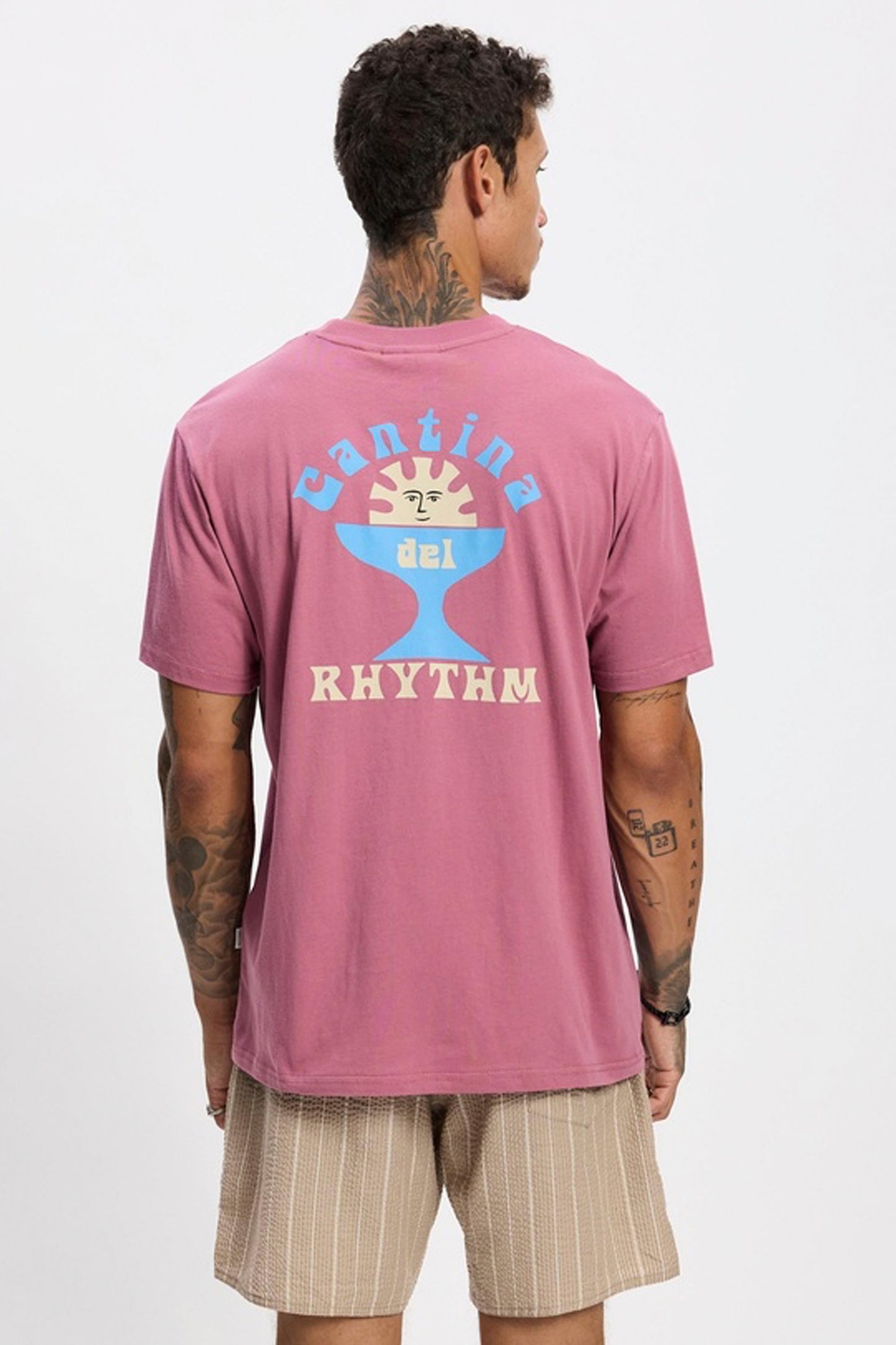 Man wearing Rhythm Cantina tee in fig - lifestyle shot showcasing dropped shoulders and relaxed fit