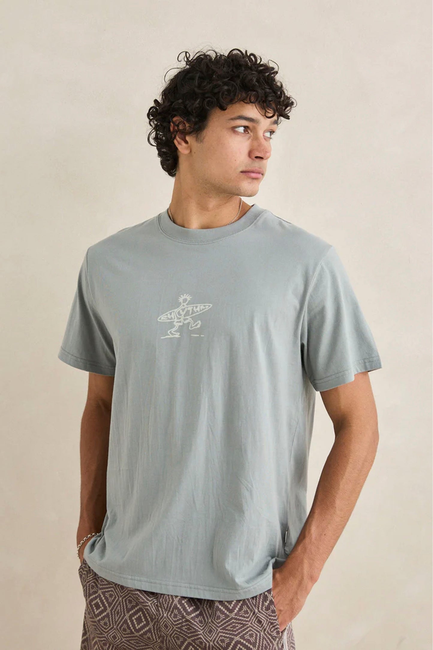 Man wearing Rhythm Drifter tee in seafoam - lifestyle shot showcasing vintage wash and relaxed style