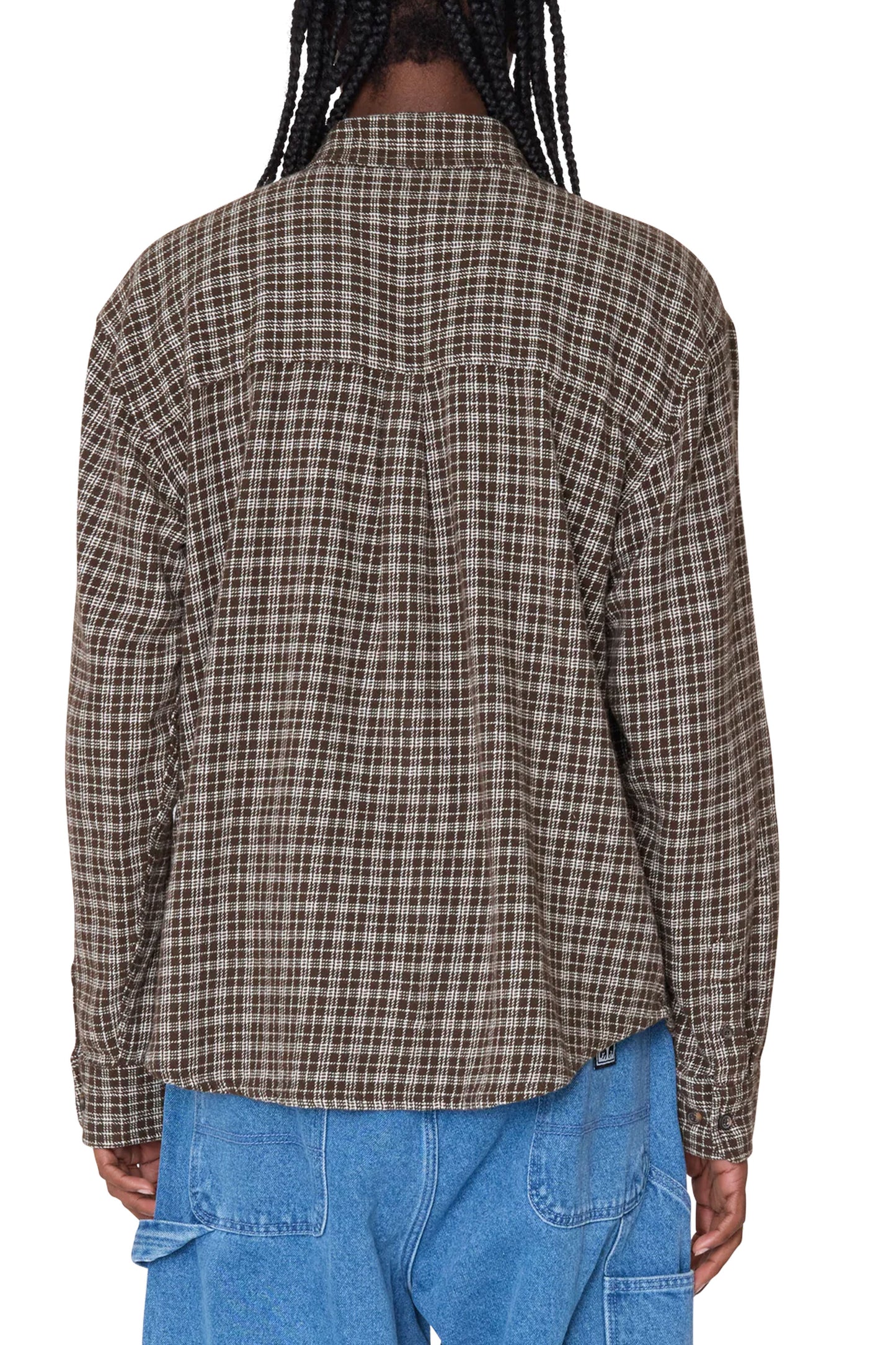 Person wearing a OBEY brown plaid shirt Pukas Surf Shop