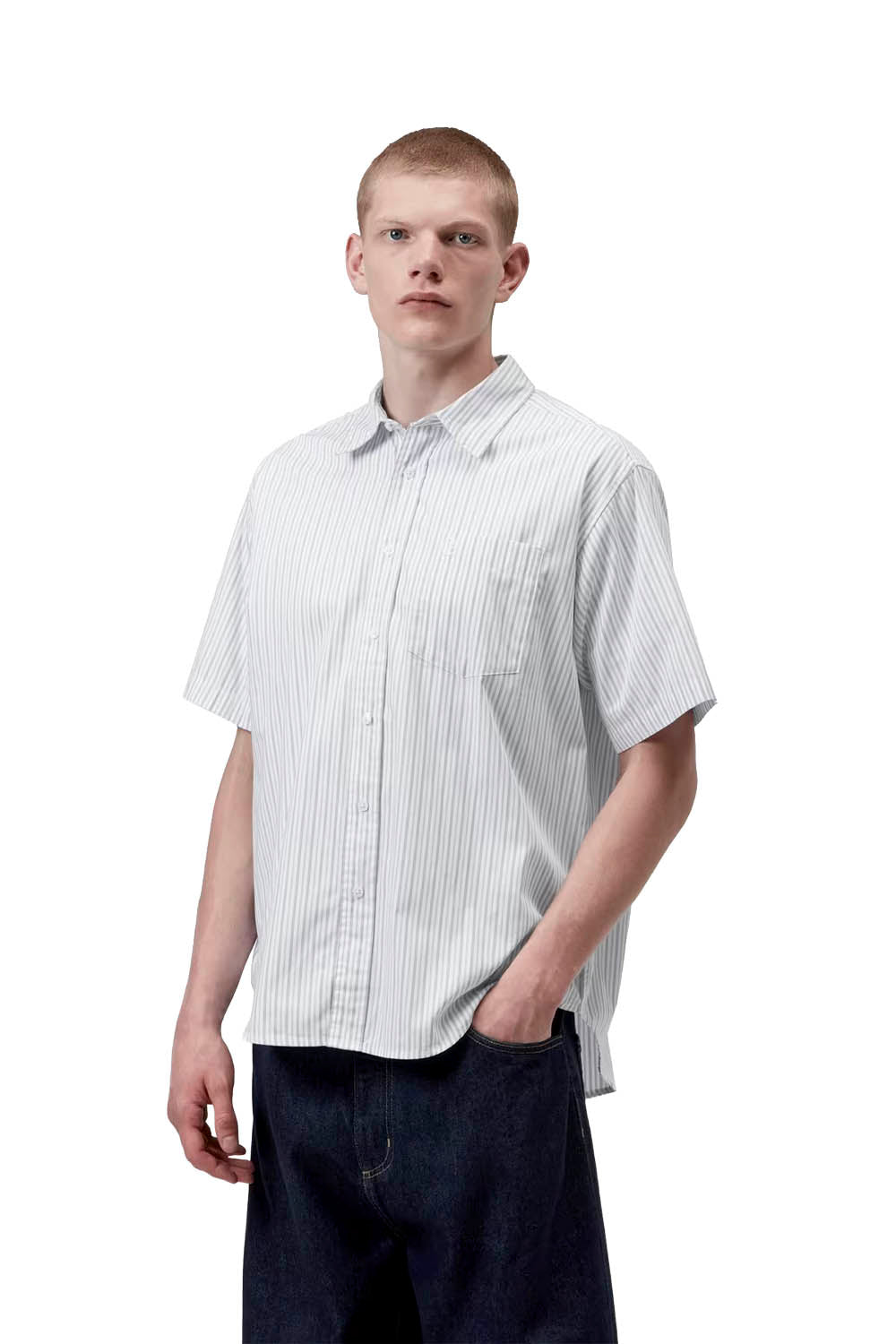 Man wearing a white short-sleeve shirt with subtle pattern on a white background