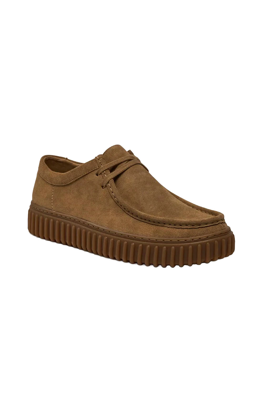 A pair of brown suede moc-toe platform creepers with a ribbed gum sole