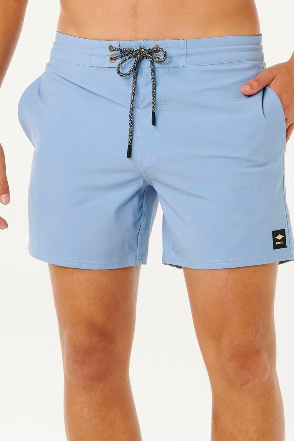 Light blue shorts with a brand logo on a white background
