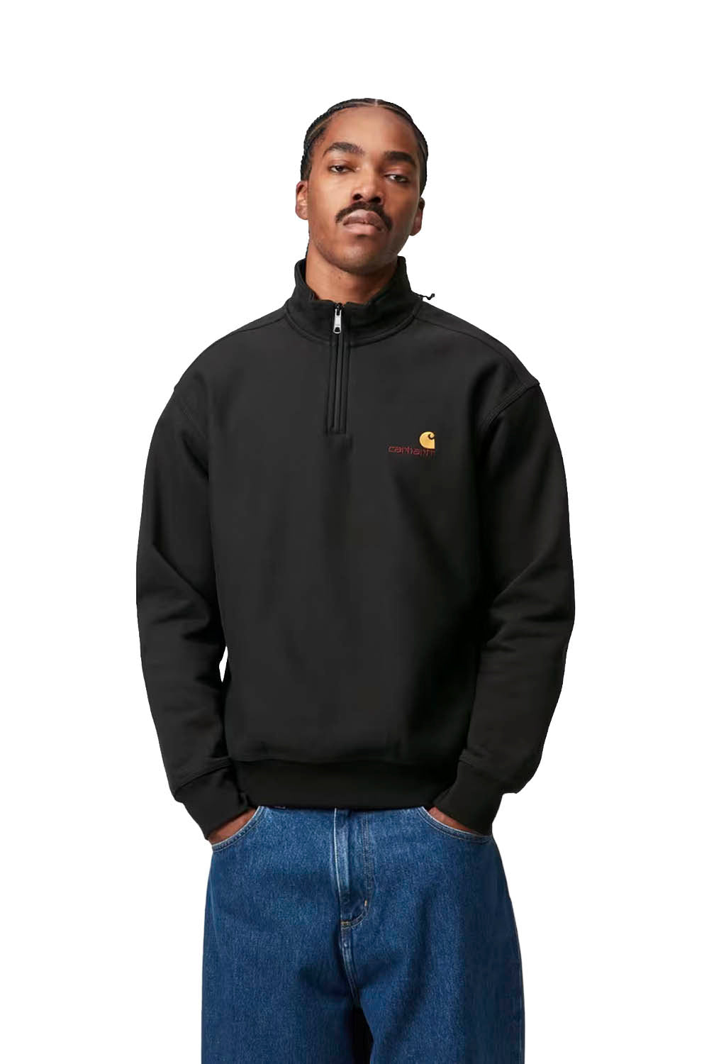 Man wearing a black Carhartt sweatshirt with a logo on a white background