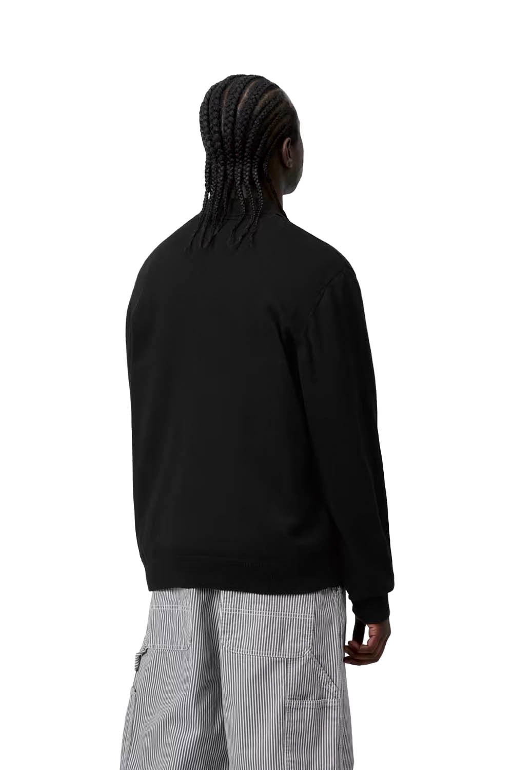 Person wearing a black hoodie from behind on a white background